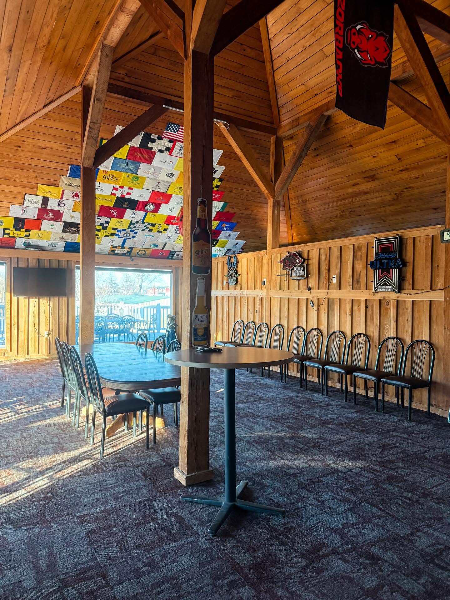 The vaulted timber dining room at the clubhouse