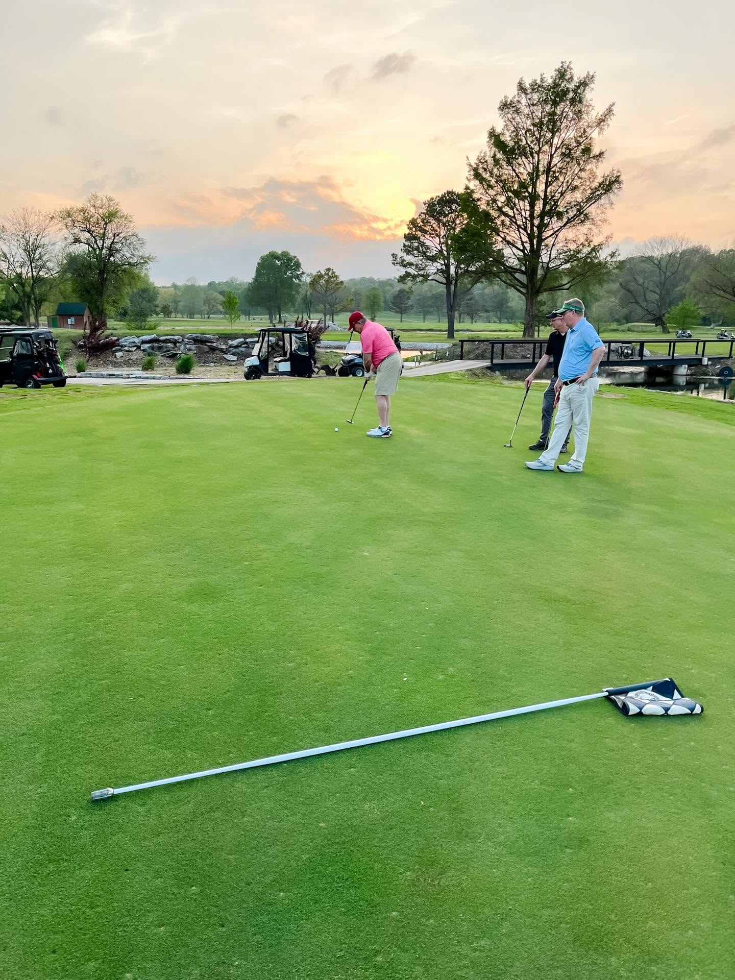 Putting on a green beside the water