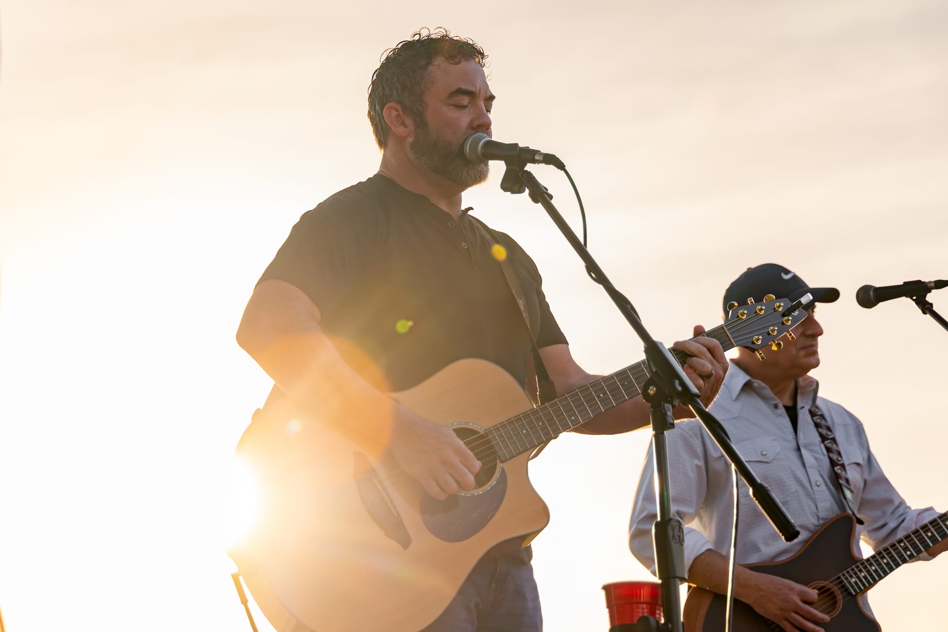 Golden-hour life at The Creeks: the patio, the music, and the course