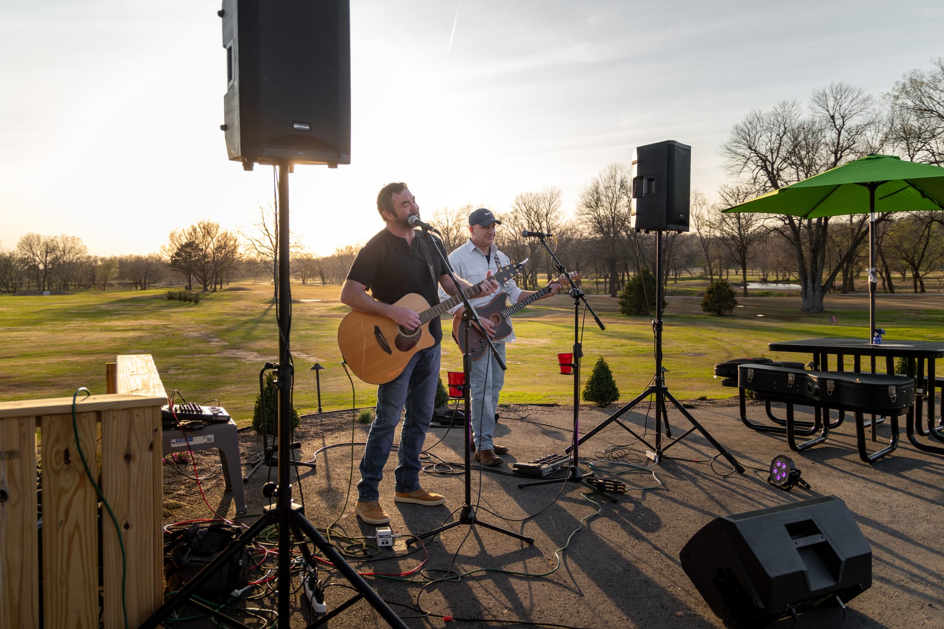 Golden-hour life at The Creeks: the patio, the music, and the course